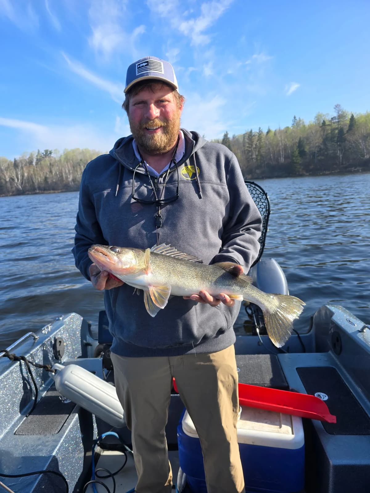 Reel Therapy guest holding a fish caught on Lake of the Woods